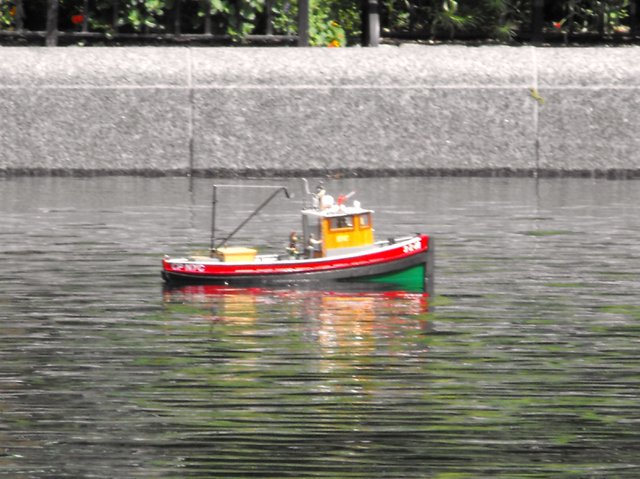 Fishing boat in the pond